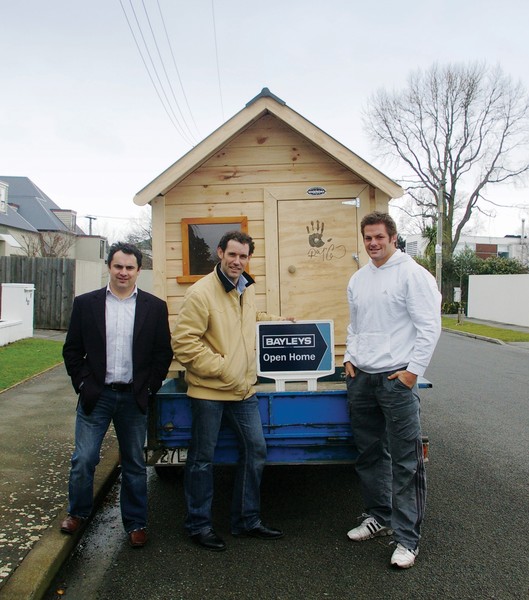 All Black captain Richie McCaw, right, 'lends a hand' to the charitable fundraising efforts of David Hiatt, left, and Hamish Jenkins. 